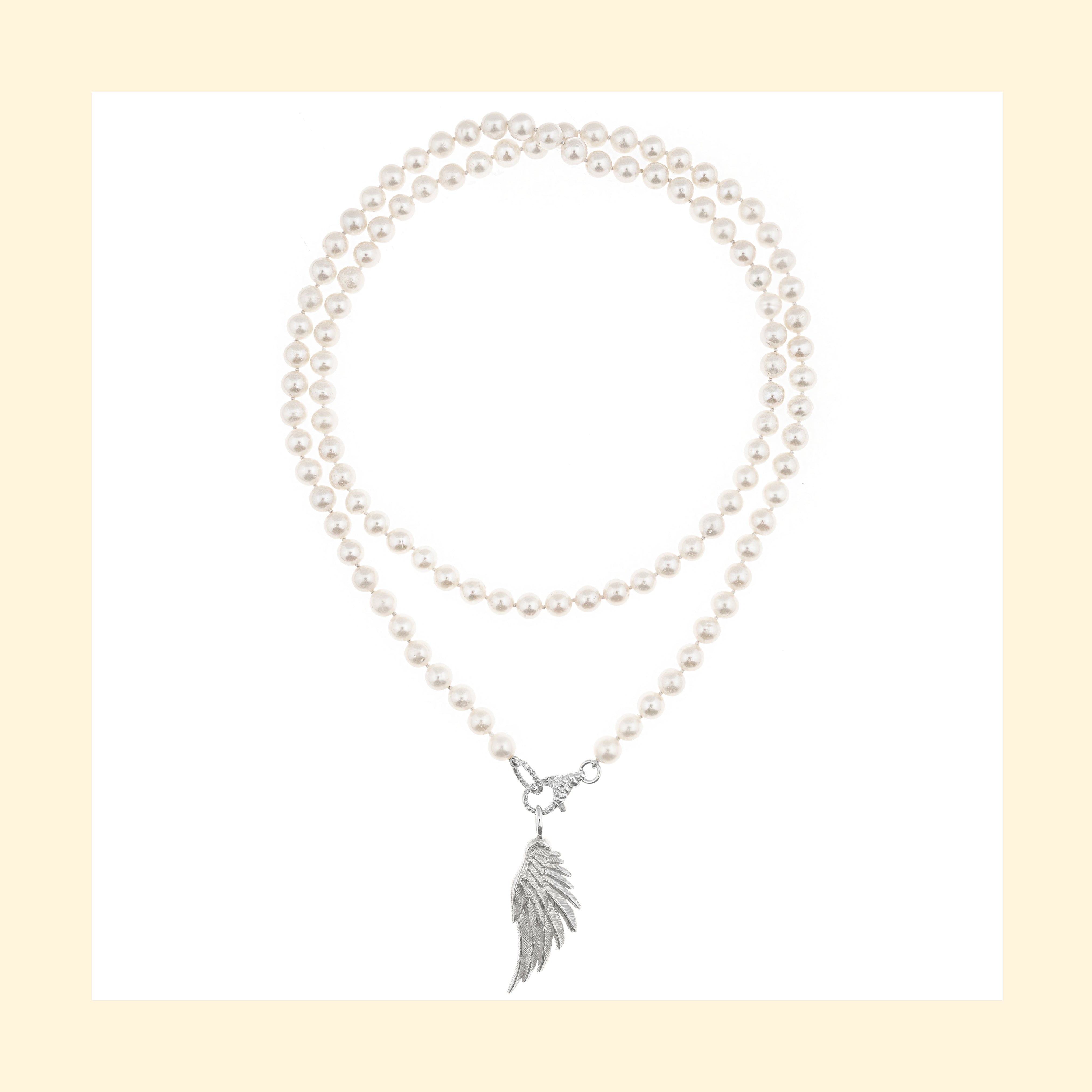 Collana Artemis Doppio filo di Perle con Ala Grande